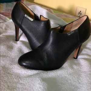 Black leather Coach shoes